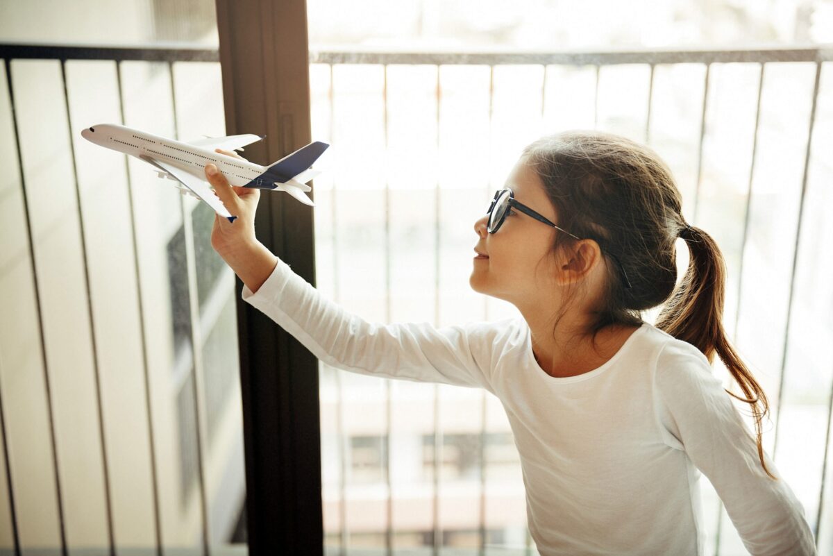 Family reviewing practical rules for flying with children